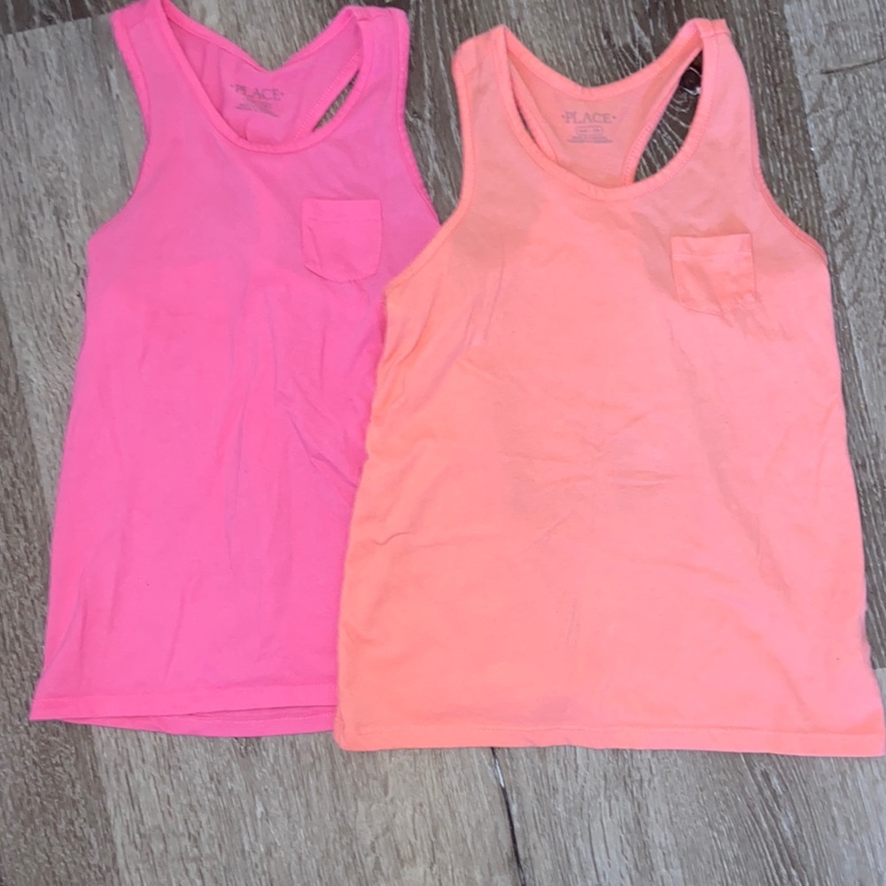 Children place tank tops